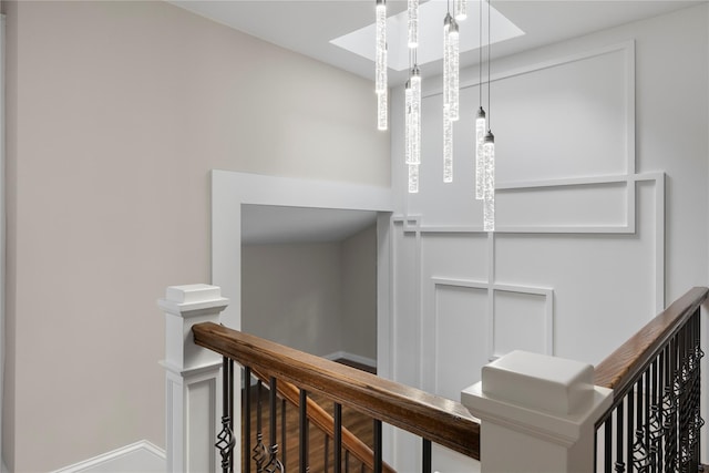 105 Julbet Dr, Sayville, NY 11782 - stairway with a skylight and baseboards