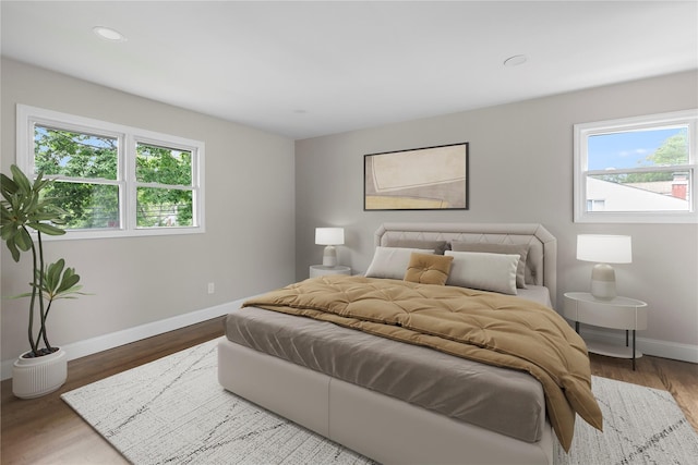 105 Julbet Dr, Sayville, NY 11782 - bedroom with wood finished floors and recessed lighting