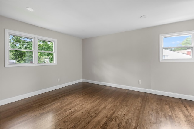 105 Julbet Dr, Sayville, NY 11782 - unfurnished room featuring baseboards and dark wood finished floors