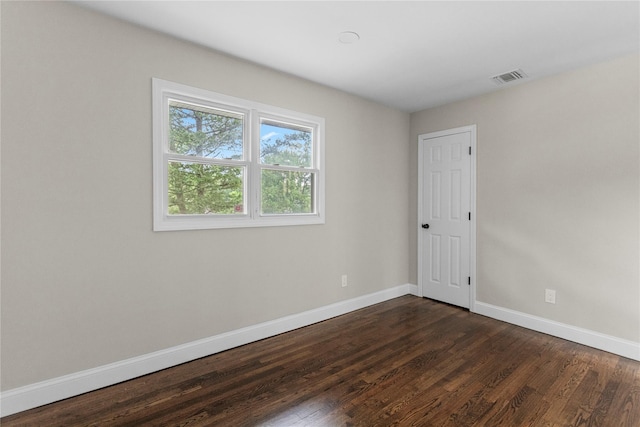 105 Julbet Dr, Sayville, NY 11782 - empty room with baseboards and dark wood-type flooring