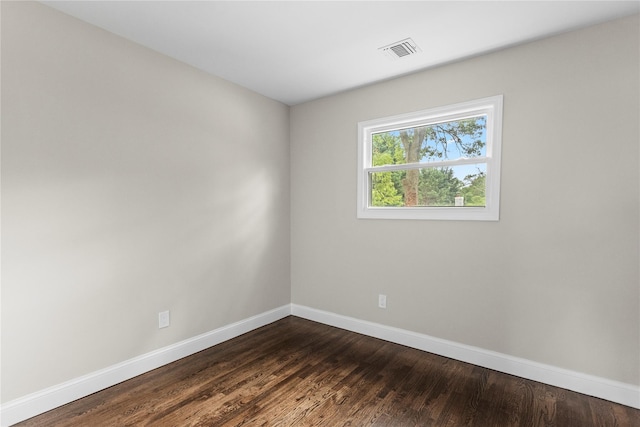 105 Julbet Dr, Sayville, NY 11782 - spare room featuring dark wood finished floors