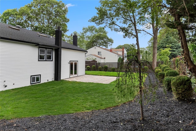 105 Julbet Dr, Sayville, NY 11782 - fenced backyard with a patio area