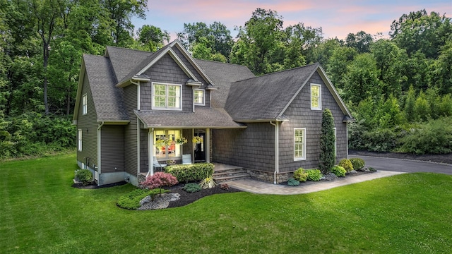 1 Hidden Hills Ct, Warwick, NY 10990 - craftsman-style home featuring covered porch, roof with shingles, and a lawn