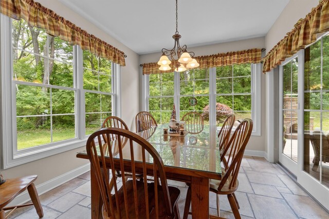1 Hidden Hills Ct, Warwick, NY 10990 - dining room with a chandelier and stone tile floors