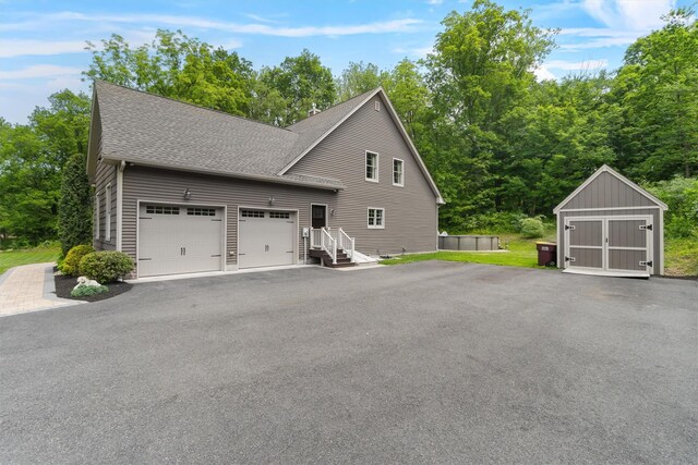 1 Hidden Hills Ct, Warwick, NY 10990 - view of home's exterior featuring a shingled roof and asphalt driveway