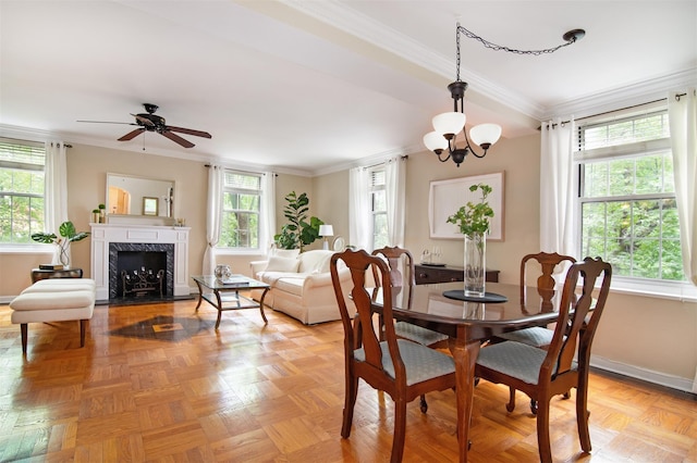 1360 Midland Ave Unit 1B, Bronxville, NY 10708 - dining space featuring ornamental molding, a chandelier, a high end fireplace, and ceiling fan