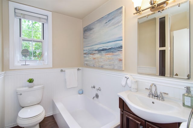 1360 Midland Ave Unit 1B, Bronxville, NY 10708 - bathroom featuring vanity, a bath, and wainscoting