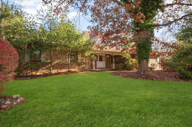175 Laurel Ln, Laurel Hollow, NY 11791 - view of front facade with a front lawn