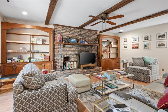 175 Laurel Ln, Laurel Hollow, NY 11791 - living area featuring wood finished floors, ceiling fan, and beamed ceiling
