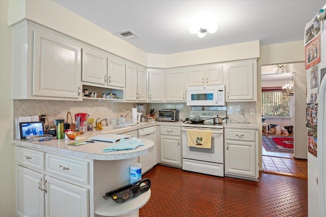 175 Laurel Ln, Laurel Hollow, NY 11791 - kitchen with white appliances, open shelves, light countertops, backsplash, and white cabinetry