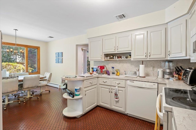 175 Laurel Ln, Laurel Hollow, NY 11791 - kitchen featuring white appliances, open shelves, light countertops, and a chandelier