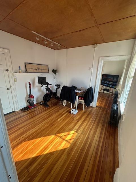 457 Main St Apt 5, Beacon, NY 12508 - interior space featuring wood finished floors and track lighting