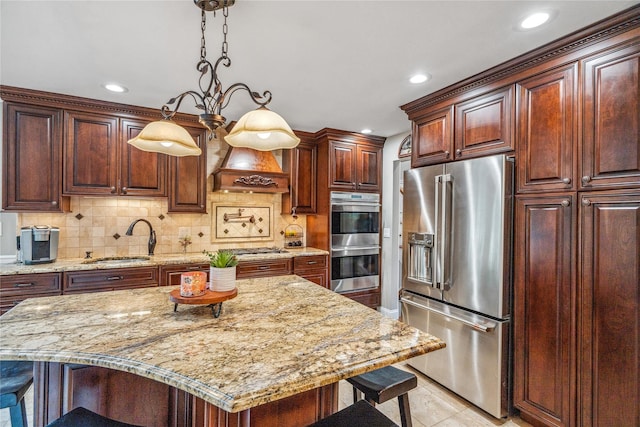 86 Phipps Ln, Plainview, NY 11803 - kitchen with appliances with stainless steel finishes, a breakfast bar area, custom exhaust hood, recessed lighting, and backsplash