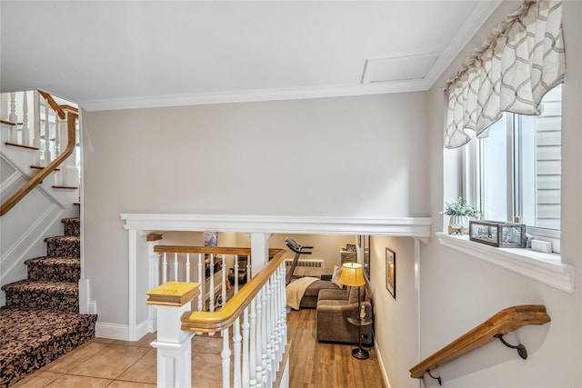 86 Phipps Ln, Plainview, NY 11803 - stairway featuring crown molding and attic access