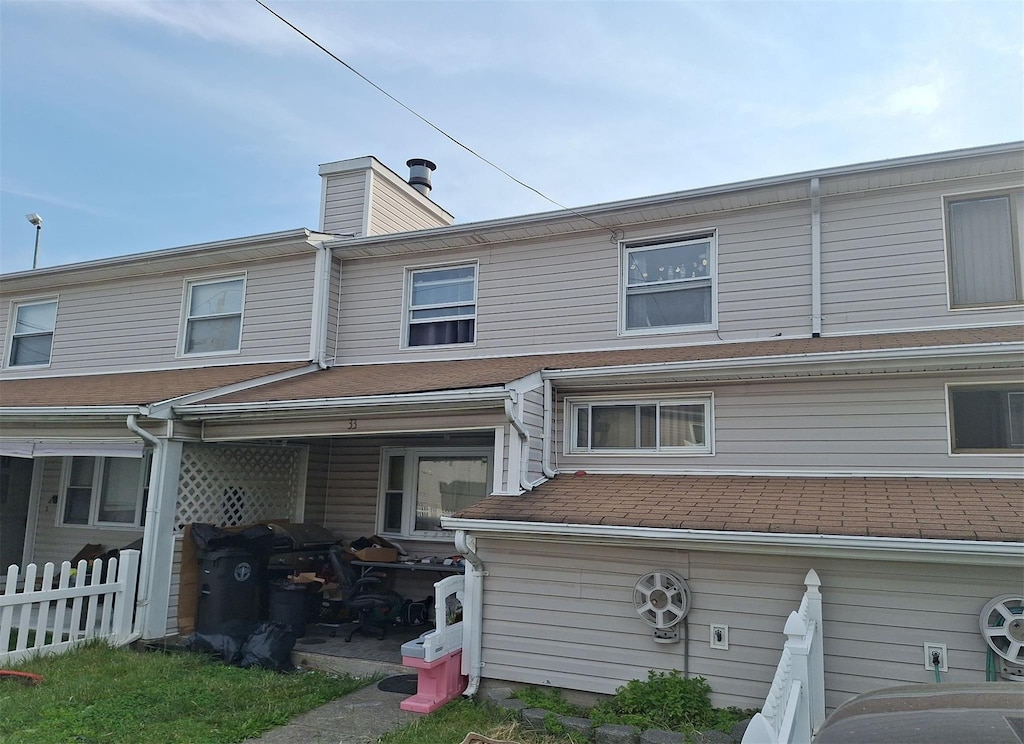 33 Marc St, Staten Island, NY 10314 - rear view of house with a chimney