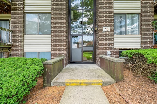 255 Country Club Ln, Pomona, NY 10970 - view of exterior entry featuring brick siding