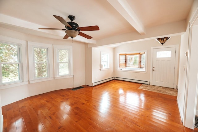 19 Harper Ave, Montrose, NY 10548 - foyer entrance featuring healthy amount of natural light, light wood-style floors, beam ceiling, a ceiling fan, and baseboard heating