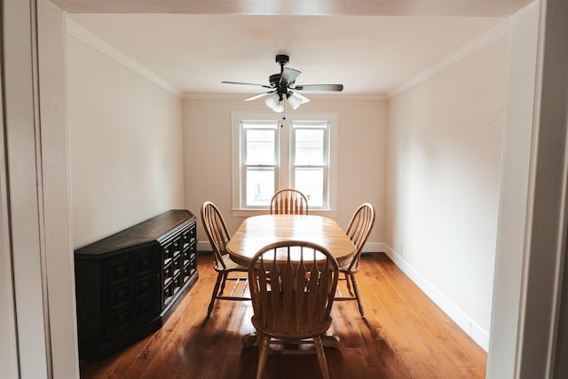 19 Harper Ave, Montrose, NY 10548 - dining room featuring hardwood / wood-style floors, crown molding, and a ceiling fan