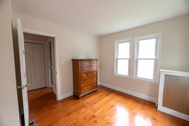 19 Harper Ave, Montrose, NY 10548 - unfurnished bedroom with baseboards and light wood-style flooring