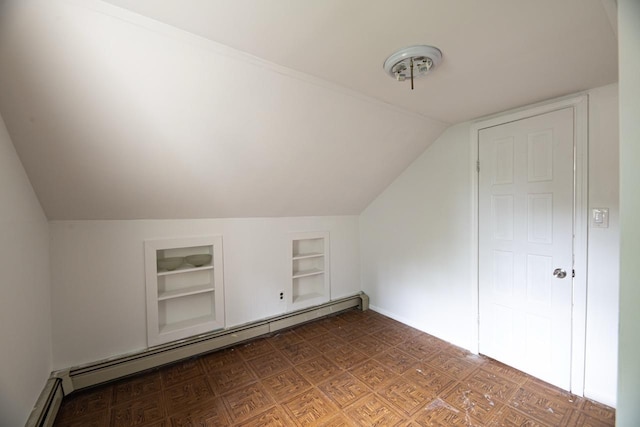 19 Harper Ave, Montrose, NY 10548 - bonus room featuring built in features, a baseboard radiator, and lofted ceiling