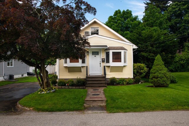 19 Harper Ave, Montrose, NY 10548 - view of front of home with a front lawn and driveway