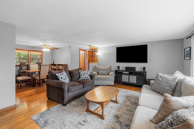 29 Chestnut St, Poughkeepsie, NY 12601 - living area with light wood-style floors and ceiling fan