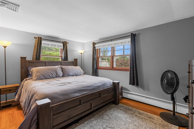 29 Chestnut St, Poughkeepsie, NY 12601 - bedroom featuring wood finished floors and baseboards
