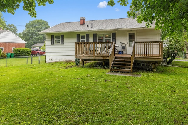 29 Chestnut St, Poughkeepsie, NY 12601 - back of house with a fenced backyard, a wooden deck, a chimney, and roof with shingles
