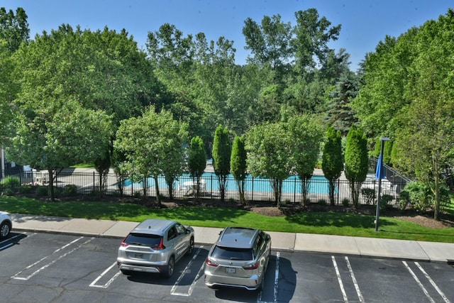 30 N De Baun Ave N Unit 208, Suffern, NY 10901 - uncovered parking lot featuring view of scattered trees