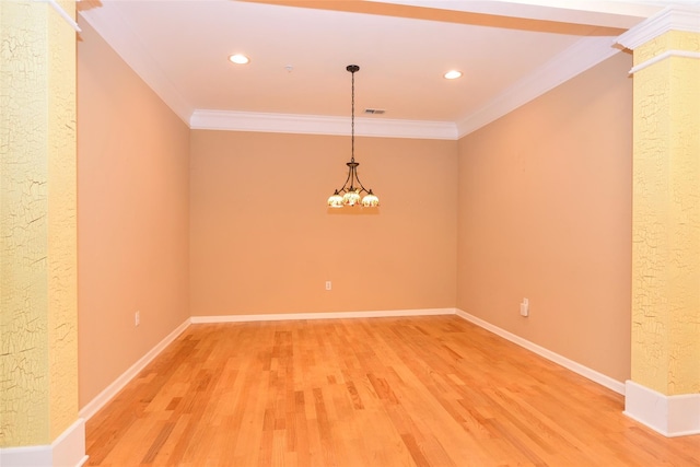 30 N De Baun Ave N Unit 208, Suffern, NY 10901 - spare room featuring crown molding, light wood-style floors, recessed lighting, a chandelier, and decorative columns