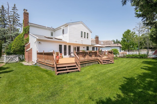 27 Bridle Path, Roslyn, NY 11576 - back of house with a chimney, a fenced backyard, and a deck