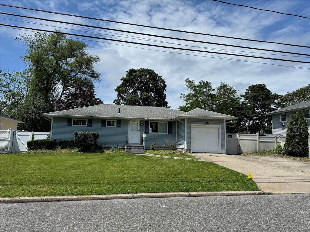 127 New Jersey Ave, Bay Shore, NY 11706 - ranch-style home with an attached garage, concrete driveway, a gate, and entry steps