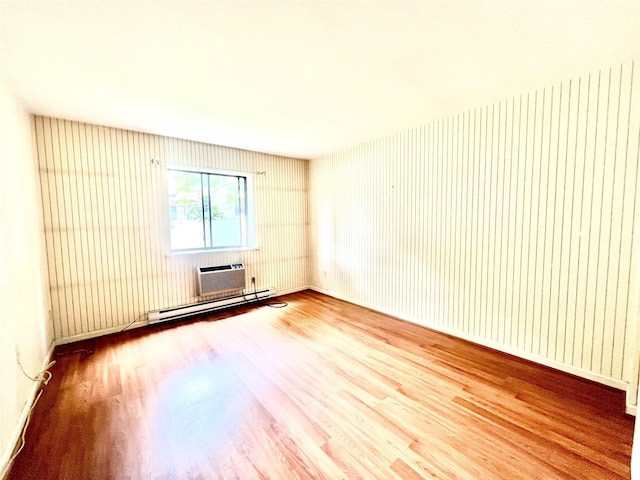 530 Hudson Ave Unit A4, Cedarhurst, NY 11516 - empty room with wood finished floors and a baseboard radiator