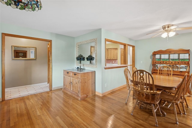 6 Grey Rock Ct, Bethpage, NY 11714 - dining area with light wood-style floors and ceiling fan