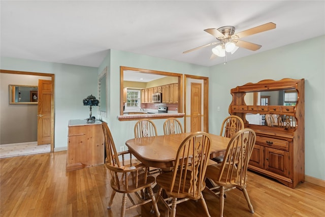 6 Grey Rock Ct, Bethpage, NY 11714 - dining room with light wood finished floors and ceiling fan
