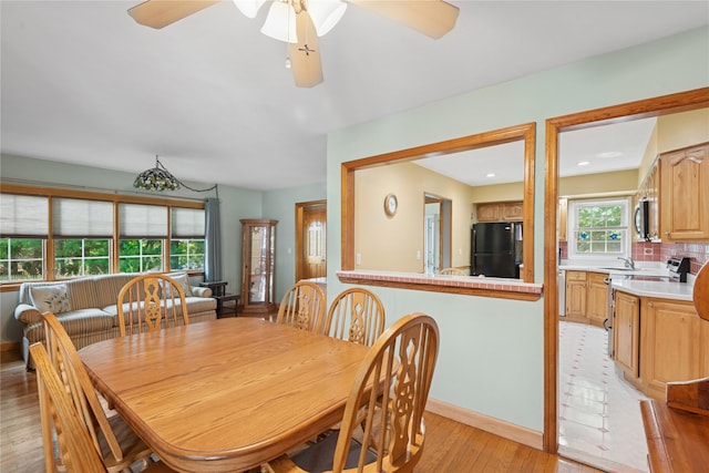 6 Grey Rock Ct, Bethpage, NY 11714 - dining space featuring light wood-type flooring and a ceiling fan