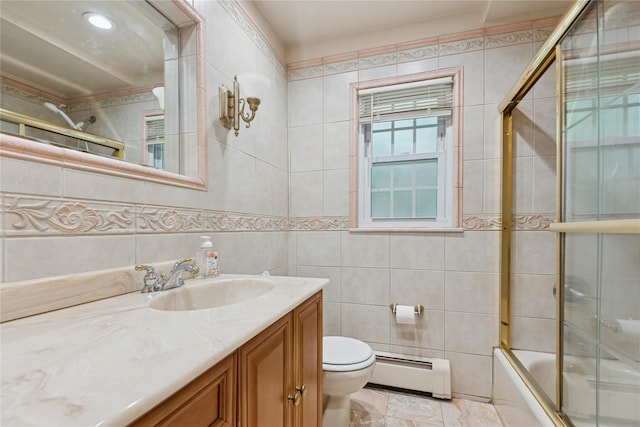 6 Grey Rock Ct, Bethpage, NY 11714 - bathroom featuring baseboard heating, vanity, enclosed tub / shower combo, and tile walls