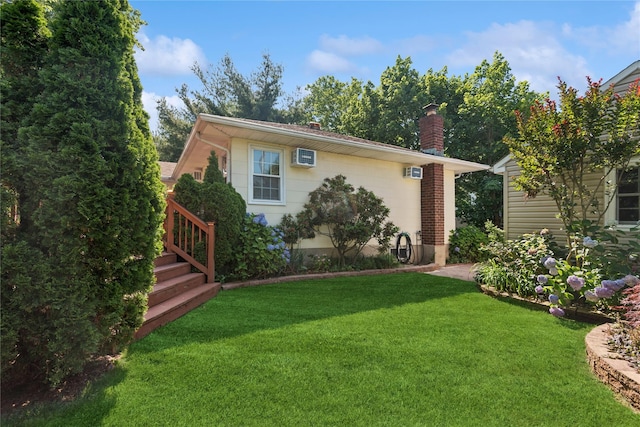 6 Grey Rock Ct, Bethpage, NY 11714 - rear view of property with a chimney and a yard