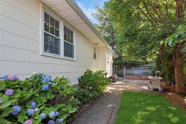 6 Grey Rock Ct, Bethpage, NY 11714 - view of side of home featuring a patio area