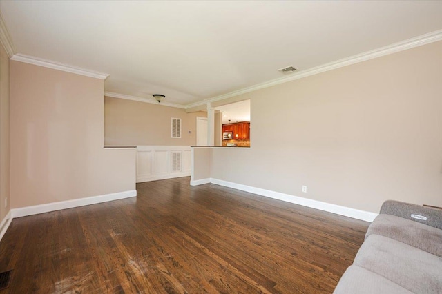 56 Lakeland Ave, Babylon, NY 11702 - unfurnished living room with crown molding and dark wood-style flooring