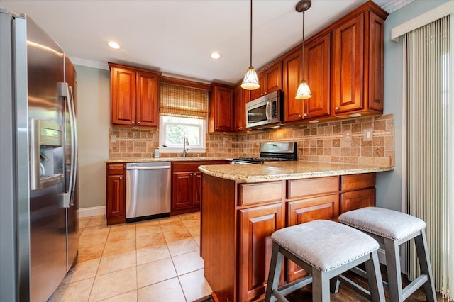 56 Lakeland Ave, Babylon, NY 11702 - kitchen featuring stainless steel appliances, a peninsula, backsplash, brown cabinetry, and decorative light fixtures