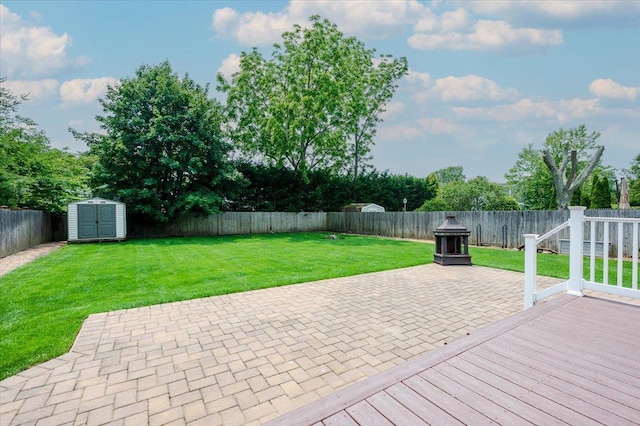 56 Lakeland Ave, Babylon, NY 11702 - deck featuring a fenced backyard, a shed, and a patio