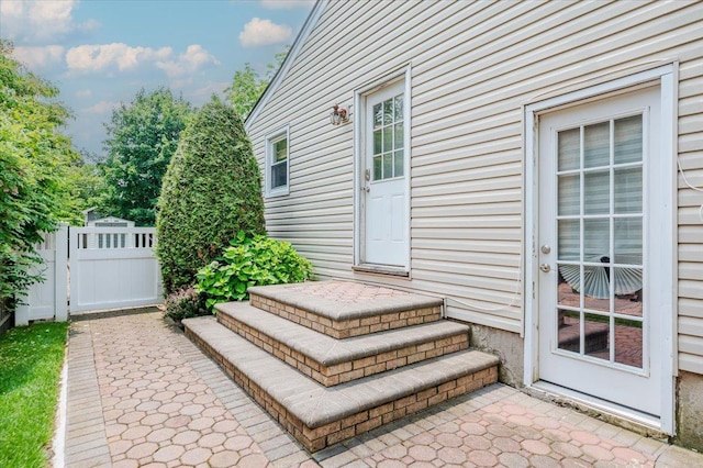 56 Lakeland Ave, Babylon, NY 11702 - doorway to property with a patio area