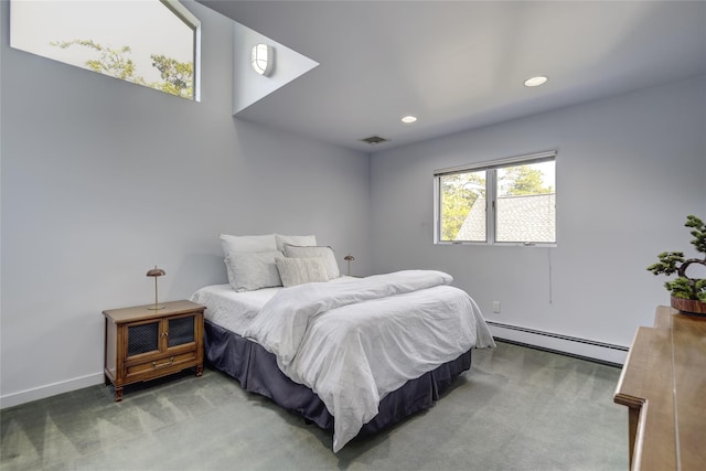 64 Highland Ave, Roslyn, NY 11576 - bedroom with baseboard heating, carpet floors, and recessed lighting
