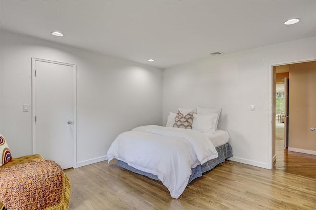 64 Highland Ave, Roslyn, NY 11576 - bedroom featuring light wood-style floors and recessed lighting