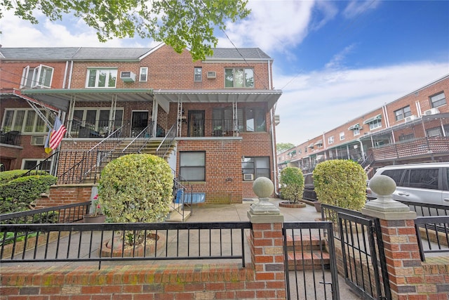 2616 Brown St, Brooklyn, NY 11235 - rear view of house with brick siding and stairs