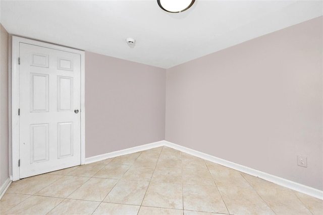 2616 Brown St, Brooklyn, NY 11235 - spare room featuring light tile patterned flooring and a smoke detector