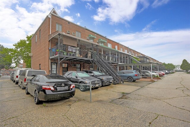 2616 Brown St, Brooklyn, NY 11235 - view of property with uncovered parking