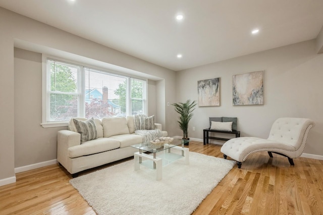 1086 Lehman Rd, West Hempstead, NY 11552 - living area with light wood finished floors and recessed lighting
