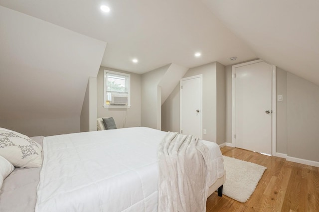 1086 Lehman Rd, West Hempstead, NY 11552 - bedroom with wood finished floors, lofted ceiling, and recessed lighting